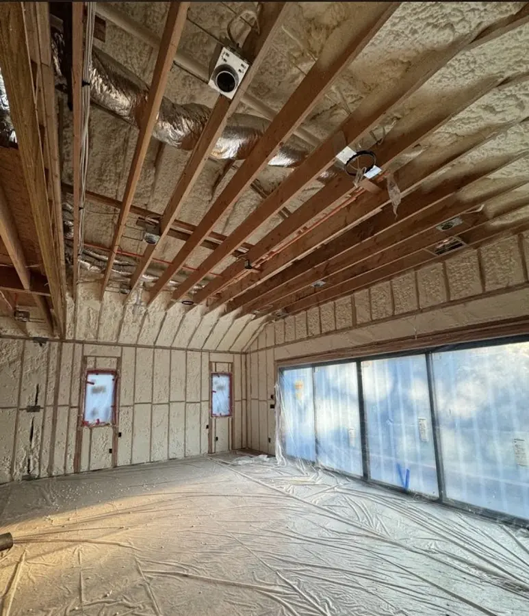 Interior walls and ceiling insulated with spray foam during new construction in Willistown